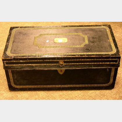 Chinese Export Brass Mounted Black Leather-clad Camphorwood Trunk. 