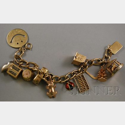 14kt Gold Charm Bracelet with Gold and Gold-filled Charms