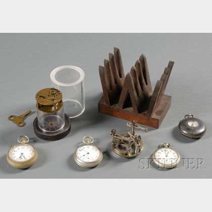 Assorted Watch and Movement Holders and Four Pocket Watches