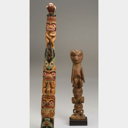 Two Northwest Carved Totem Poles