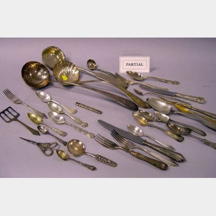 Approximately 160 Pieces of Assorted Sterling, Coin, and Silver Plated Flatware