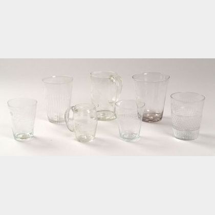 Seven Colorless Blown Glass Drinking Vessels