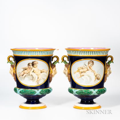 Pair of Majolica Glazed Earthenware Urns