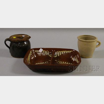 Slip Decorated Glazed Redware Divided Dish, a Glazed Pottery Jug with Cover, and a Small Crock. 