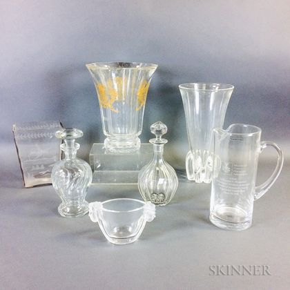 Seven Colorless Glass Vessels