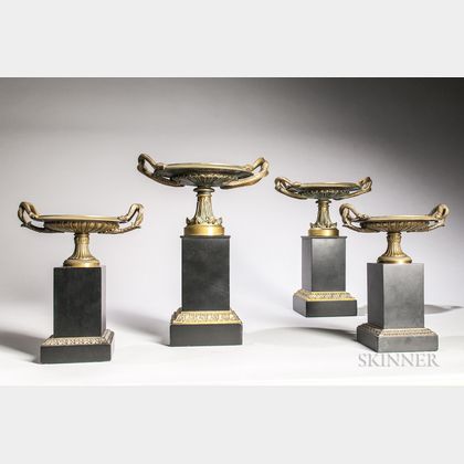 Two Pairs of Neoclassical-style Cast Bronze Tazza on Stone Plinths