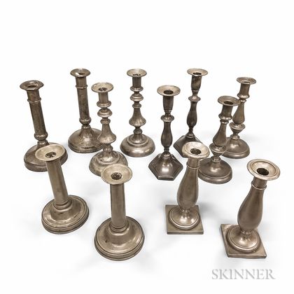 Six Pairs of Pewter Candlesticks