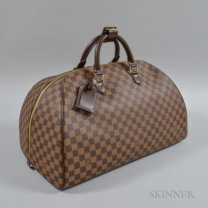 Sold at Auction: LOUIS VUITTON WEEKENDER BAG