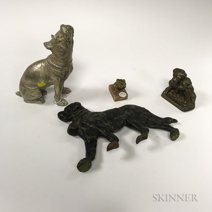 Eight Mostly Cast Metal Dogs