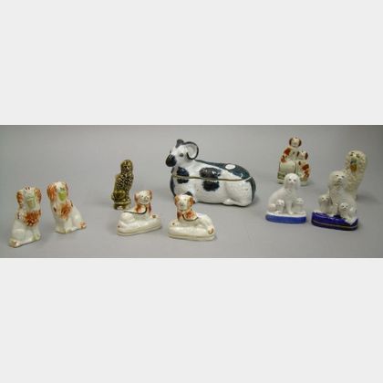 Eight Small Staffordshire Dog Figures, a Rockingham Glazed Seated Dog, and a Russian Glazed Porcelain Sheep-for... 