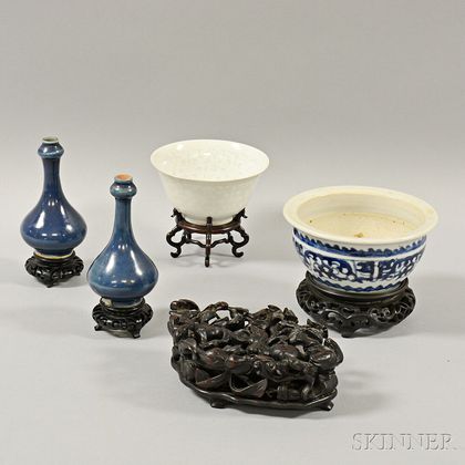 Four Ceramic Items and a Wood Stand