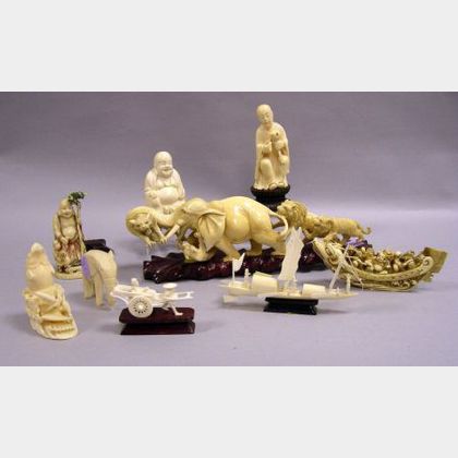 Nine Chinese and African Carved Ivory Figures. 