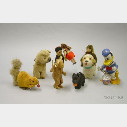 Group of Seven Small Clockwork Toys and a Tiny Chimp