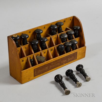Small Dennison's "Initial Sealing Wax Seals" Display and Eighteen Seals. Estimate $150-250