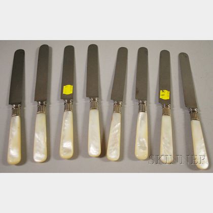 Set of Eight Tiffany & Co. Mother-of-pearl-handled Dinner Knives. Estimate $150-200