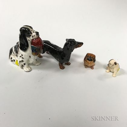 Four Royal Doulton Porcelain Dogs