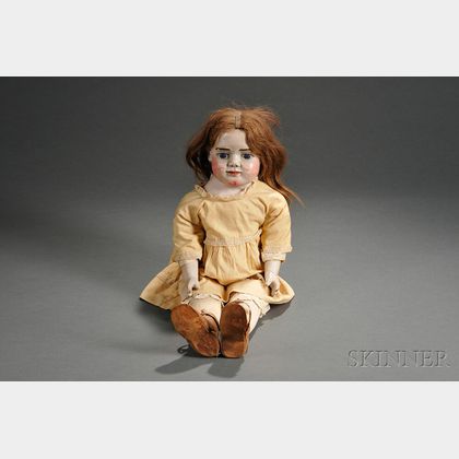 Carved Wooden and Cloth Doll