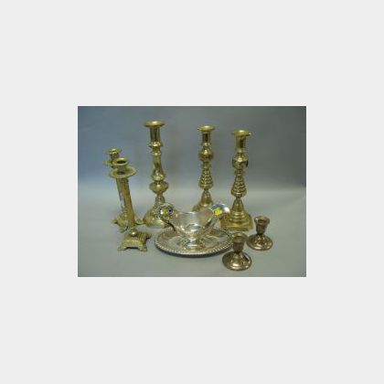 Two Pairs of Brass Candlesticks, a Silver Plated Gravy Boat, a Pair of Sterling Candleholders and a Brass Candlestick. 