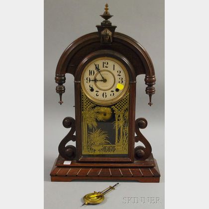 E. Ingraham Carved Walnut Shelf Clock