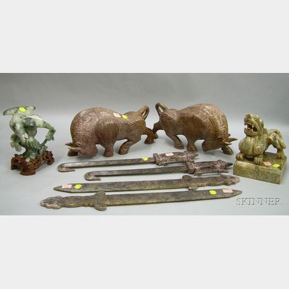 Four Asian Carved Hardstone Figures and Two Pairs of Carved Hardstone Edged Weapons