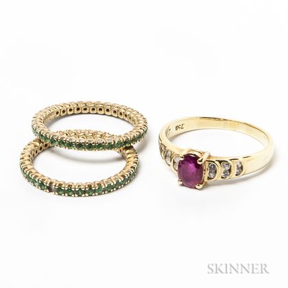 Two 18kt Gold and Peridot Bands and a 14kt Gold, Ruby, and Diamond Ring