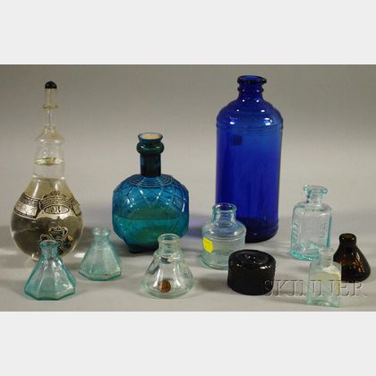 Eight Assorted Glass Inkwells, Bottles, and Two Glass Fire Grenades