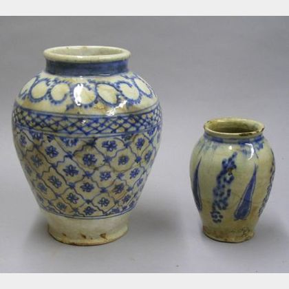 Two Persian Blue and White Decorated Faience Vases. 