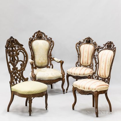 Four Rococo Revival Carved and Laminated Rosewood Chairs. Estimate $200-300