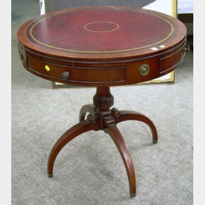 Regency-style Leather-inset Mahogany Pedestal-base Drum Table. 
