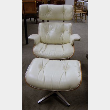 Eames-style White Leather Upholstered Laminated Wood Lounge Chair and Ottoman. 
