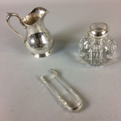 Coin Silver Engraved Water Pitcher, Cut-glass, Silver-topped Cannister, and a Pair of Silver-plated Tongs