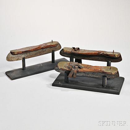 Pair and a Single Carved Wood and Brass Ice Skates