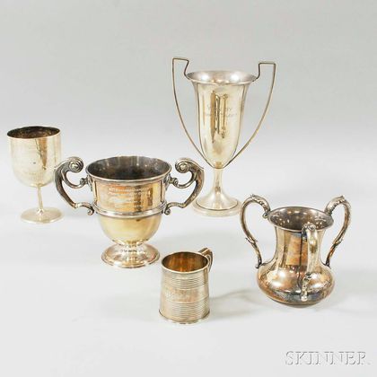 Four Sterling Silver Trophies and a Small Mug