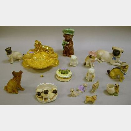 Group of Fourteen Ceramic Pug Figurines, a French Pottery Pug-form Inkstand, and a Decorated Pottery Paperweight. 