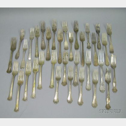 Approximately Thirty-four Assorted Sterling Silver Forks. 