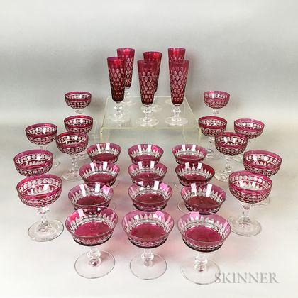 Thirty Pieces of Cranberry Cut-to-clear Glass Stemware
