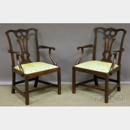 Pair of Chippendale-style Carved Mahogany Scroll-arm Chairs with Upholstered Slip Seats. 