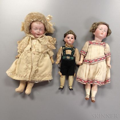 Three Small Bisque Dolls