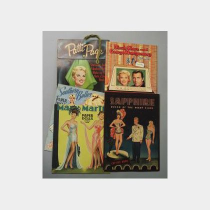 Four Uncut Celebrity and Comic Paper Doll Books