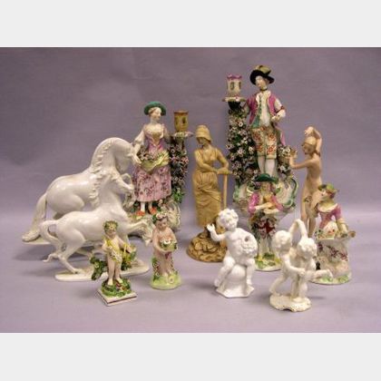 Twelve Assorted Continental Pottery and Porcelain Figures. 