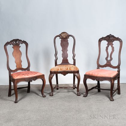 Three Chippendale-style Carved Side Chairs