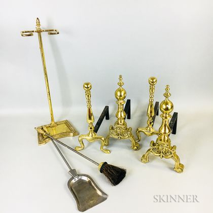 Two Pairs of Brass Andirons, a Brush, a Shovel, and a Fireplace Tool Stand. Estimate $100-200