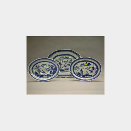 Pair of Canton Oval Trays and an Oblong Platter, China, 19th century, (repairs to platter edge),dia. 11 1/8, 14 1/8 in. 