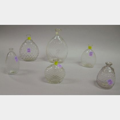 Six German Colorless Blown Molded Glass Bottles. 