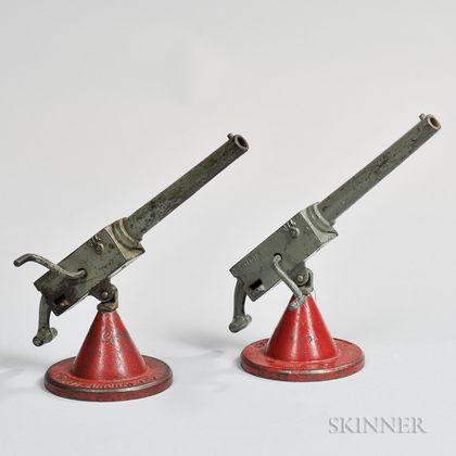 Two Painted Cast Iron "ANTI-AIRCRAFT" Cap Toys