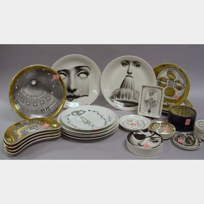 Thirty-five Pieces of Fornasetti Transfer Decorated Porcelain and Four Jean Cocteau Designed Transfer Decorated Porcelain Plates