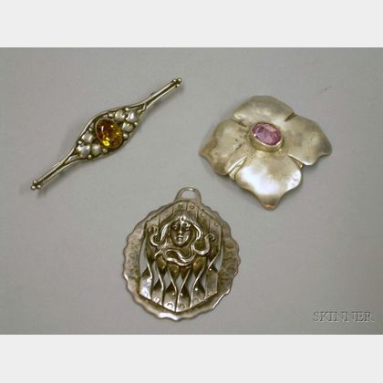 Two Sterling Silver Arts & Crafts Brooches and an Art Nouveau Pendant. 