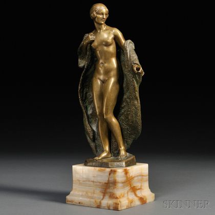 After Joe Descomps (French, 1869-1950) Bronze Figure of a Nude Woman with a Fur Coat