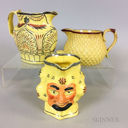 Three Staffordshire Yellow-glazed Ceramic Jugs