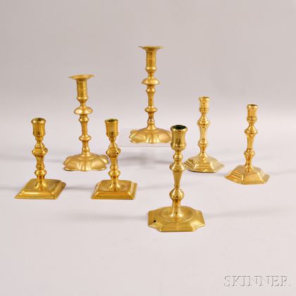 Two Pairs and Three Single English Brass Candlesticks